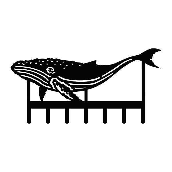 A black, steel key rack featuring the silhouette of a humpback whale with seven hooks at the bottom.